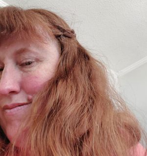 Artist Leyna Hall shown in side profile